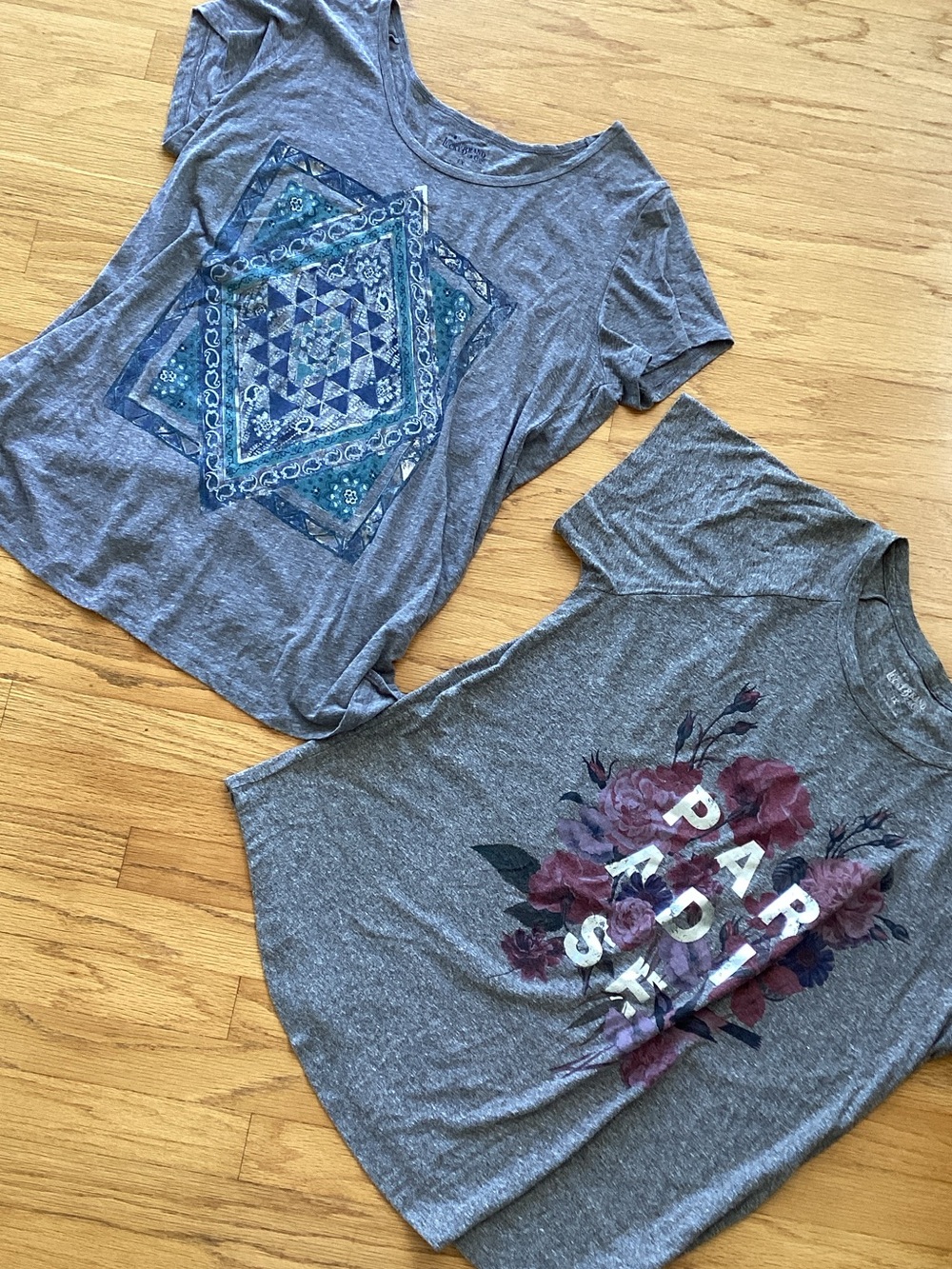 Two Lucky Brand Gray Graphic Tees with Floral & Geometric Prints